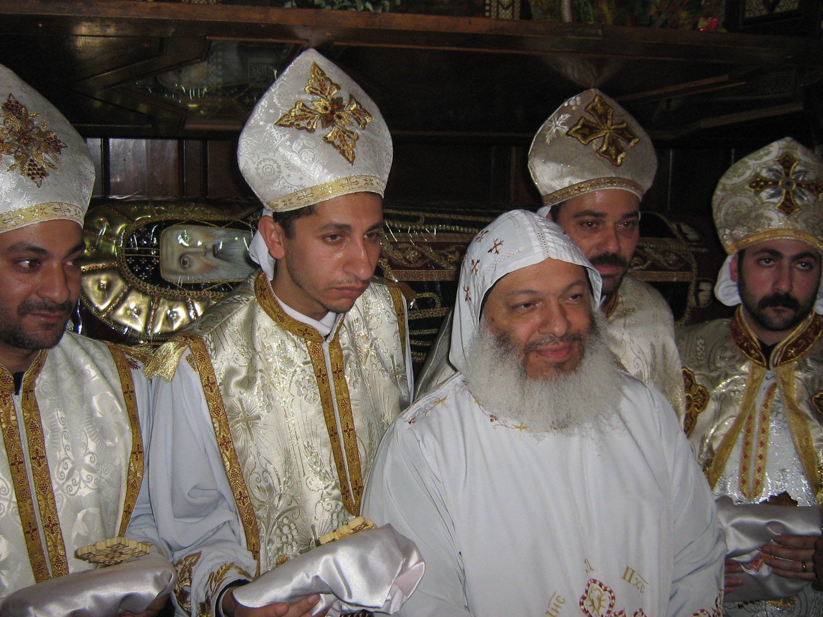 Clergy blessing the congregation