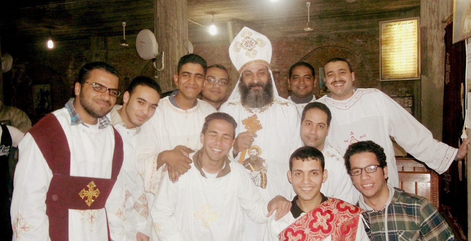 Bishop with church servants and youth